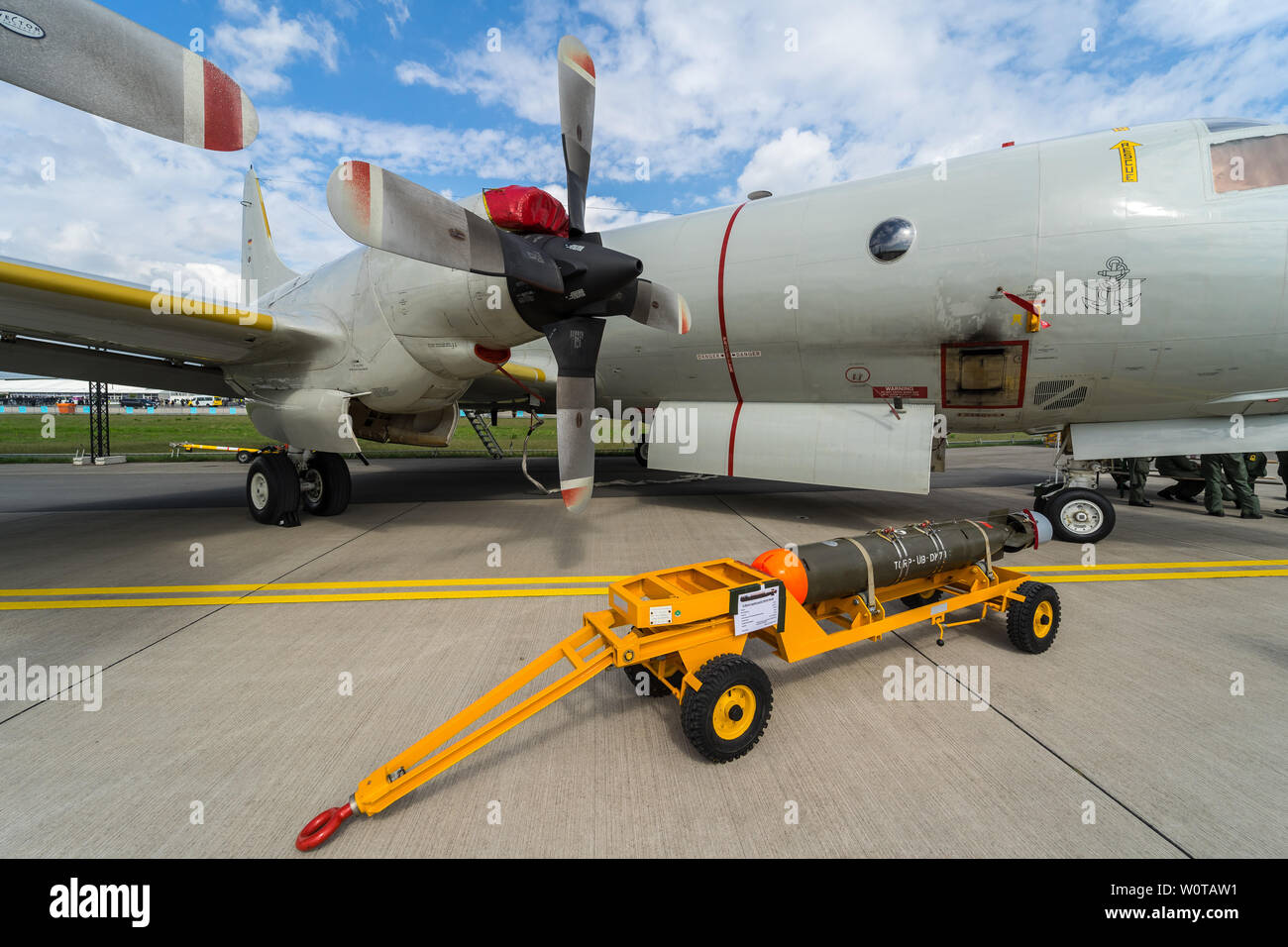 BERLIN, GERMANY - APRIL 25, 2018: Maritime patrol aircraft Lockheed P-3C Orion and lightweight antisubmarine torpedo Mark 46, Mod 5 in the foreground. German Navy. Exhibition ILA Berlin Air Show 2018. Stock Photo