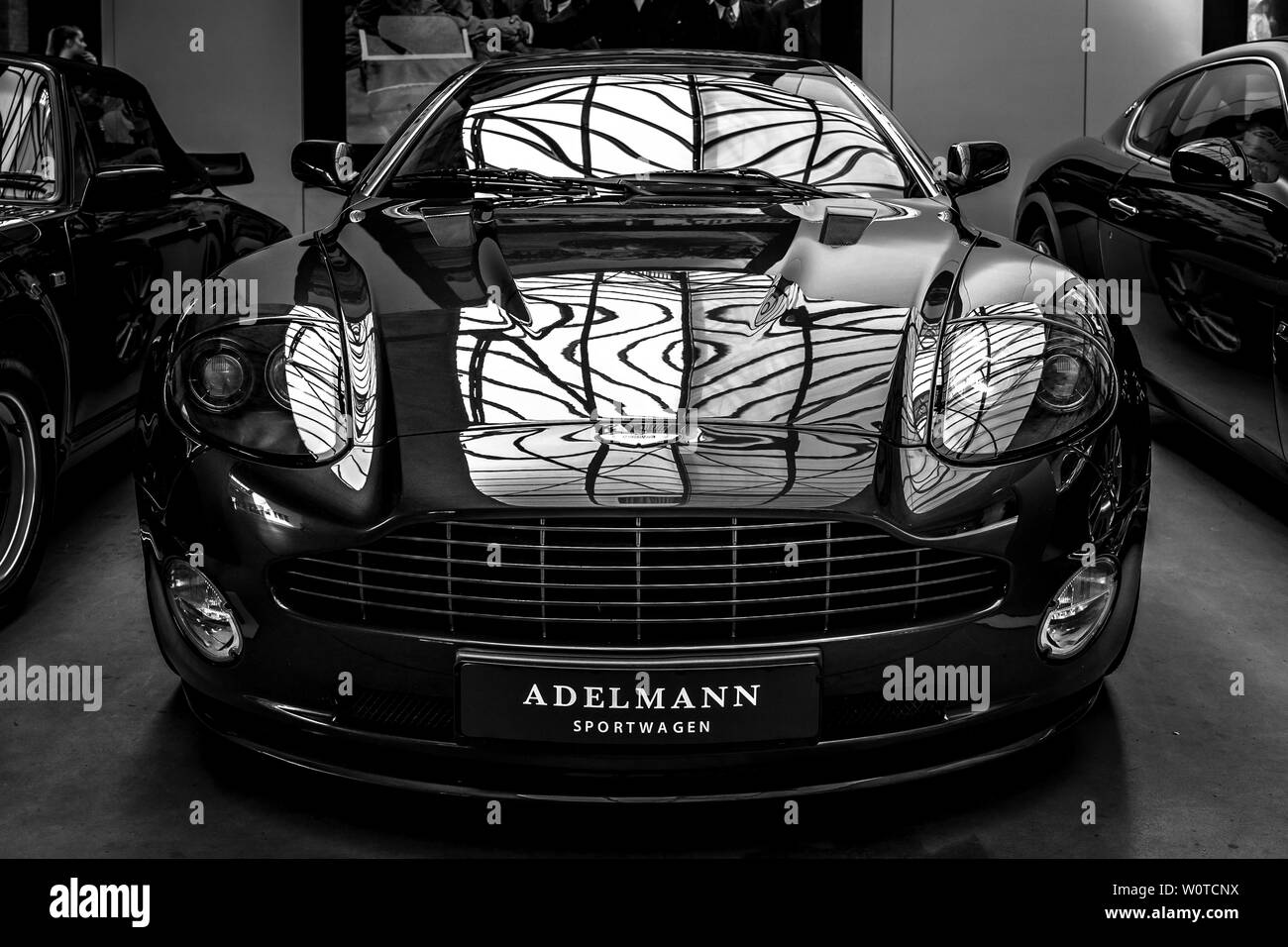 BERLIN - MAY 06, 2018: Super grand tourer car Aston Martin Vanquish S, 2005. Black and white. Exhibition 31. Oldtimertage Berlin-Brandenburg (31th Berlin-Brandenburg Oldtimer Day). Stock Photo