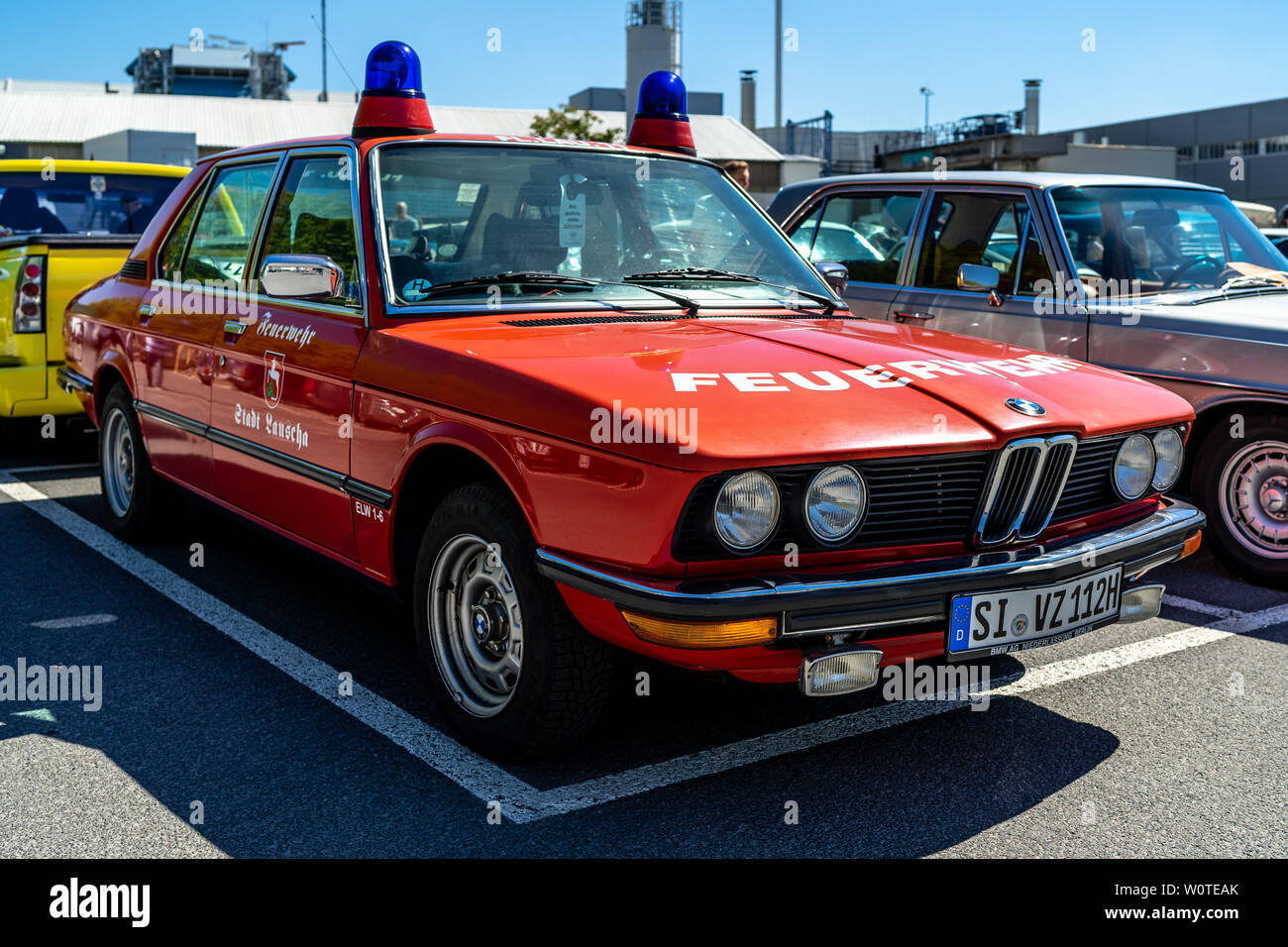 BERLIN - MAY 06, 2018: Executive car BMW 520/6 (E12) 1977, in the color of the duty car of the fire department. Oldtimertage Berlin-Brandenburg (31th Berlin-Brandenburg Oldtimer Day). Stock Photo