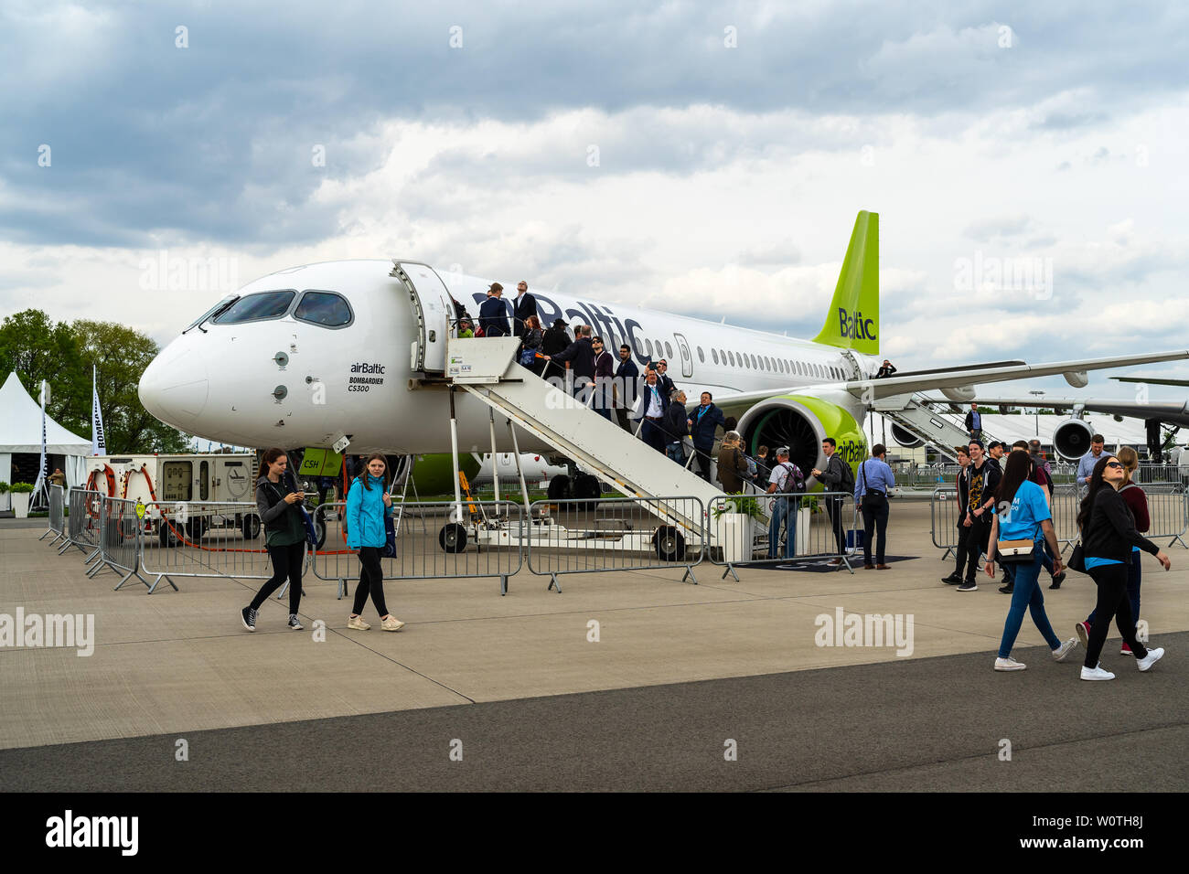 BERLIN - APRIL 27, 2018: The narrow-body jet airliner Bombardier CS300, by AirBaltic. Exhibition ILA Berlin Air Show 2018. Stock Photo