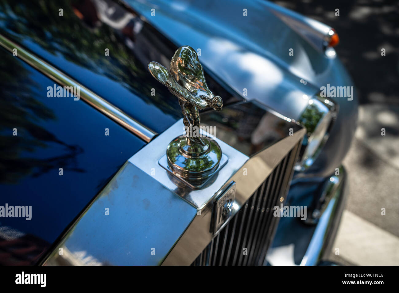 BERLIN - JUNE 09, 2018: The famous emblem 'Spirit of Ecstasy' on the Rolls-Royce luxury car. Classic Days Berlin 2018. Stock Photo