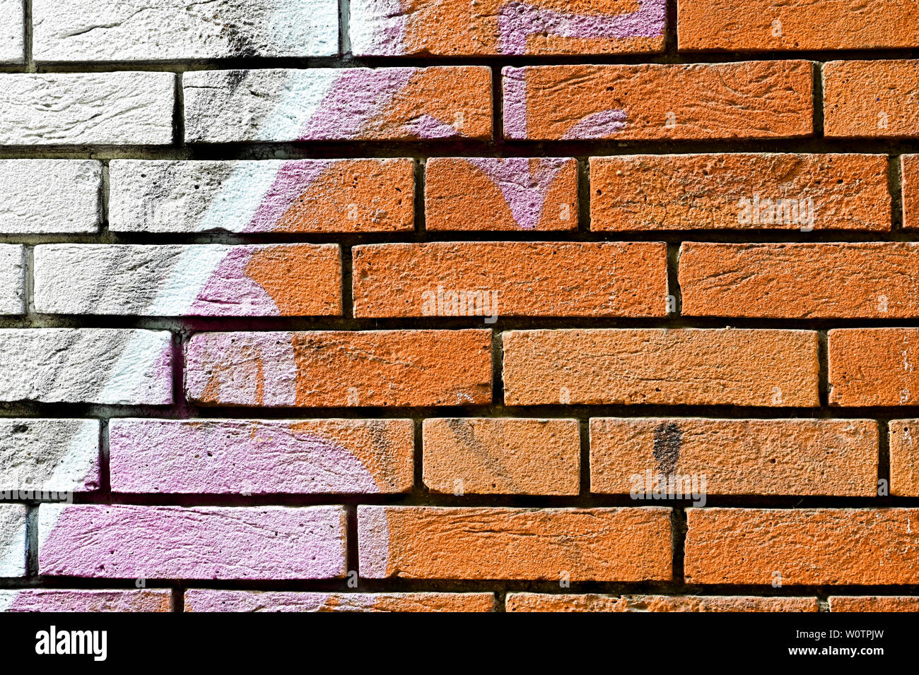 Texture of red bricks. Decorative stone. Realistic wide Red brick wall background. Template design and web banners. Stock Photo