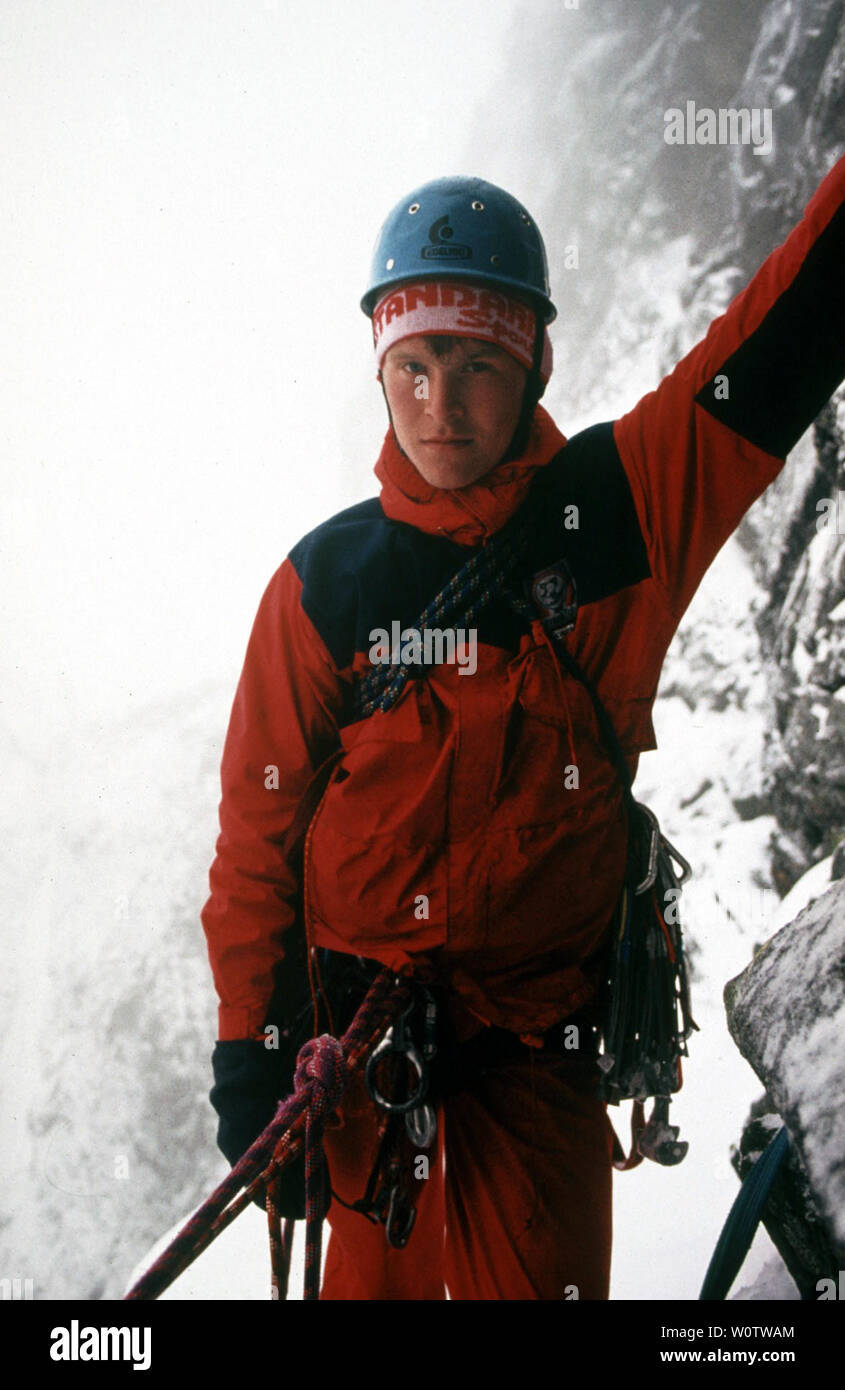 Outdoor photographer Øyvind Martinsen on a climb on the mountain Søre Dyrhaugstind in Hurrungane, Jotunheimen, Norway. October, 1987. Stock Photo