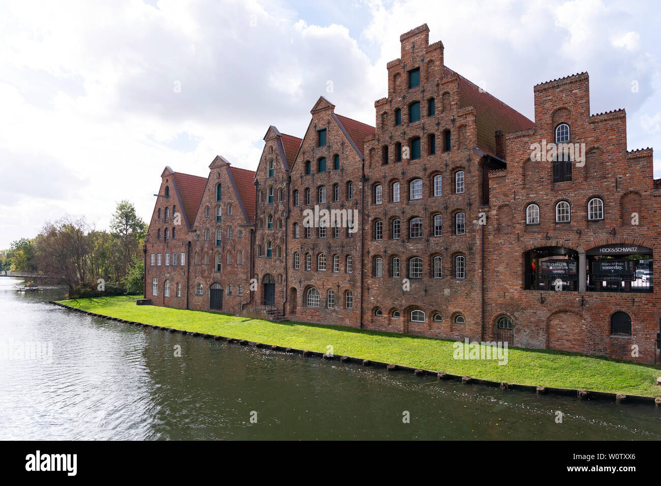 Salt storage building in the city of Lübeck on the Trave shore. Stock Photo