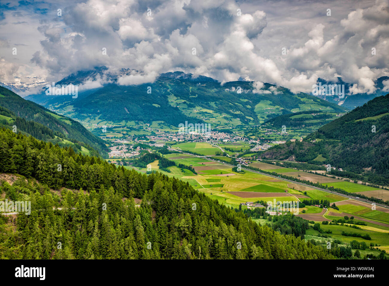 Distant view of town of Sterzing (Vipiteno) in Eisack Valley, from road SS508 near Penserjoch (Passo Pennes), Sarntal Alps, Trentino-Alto Adige, Italy Stock Photo