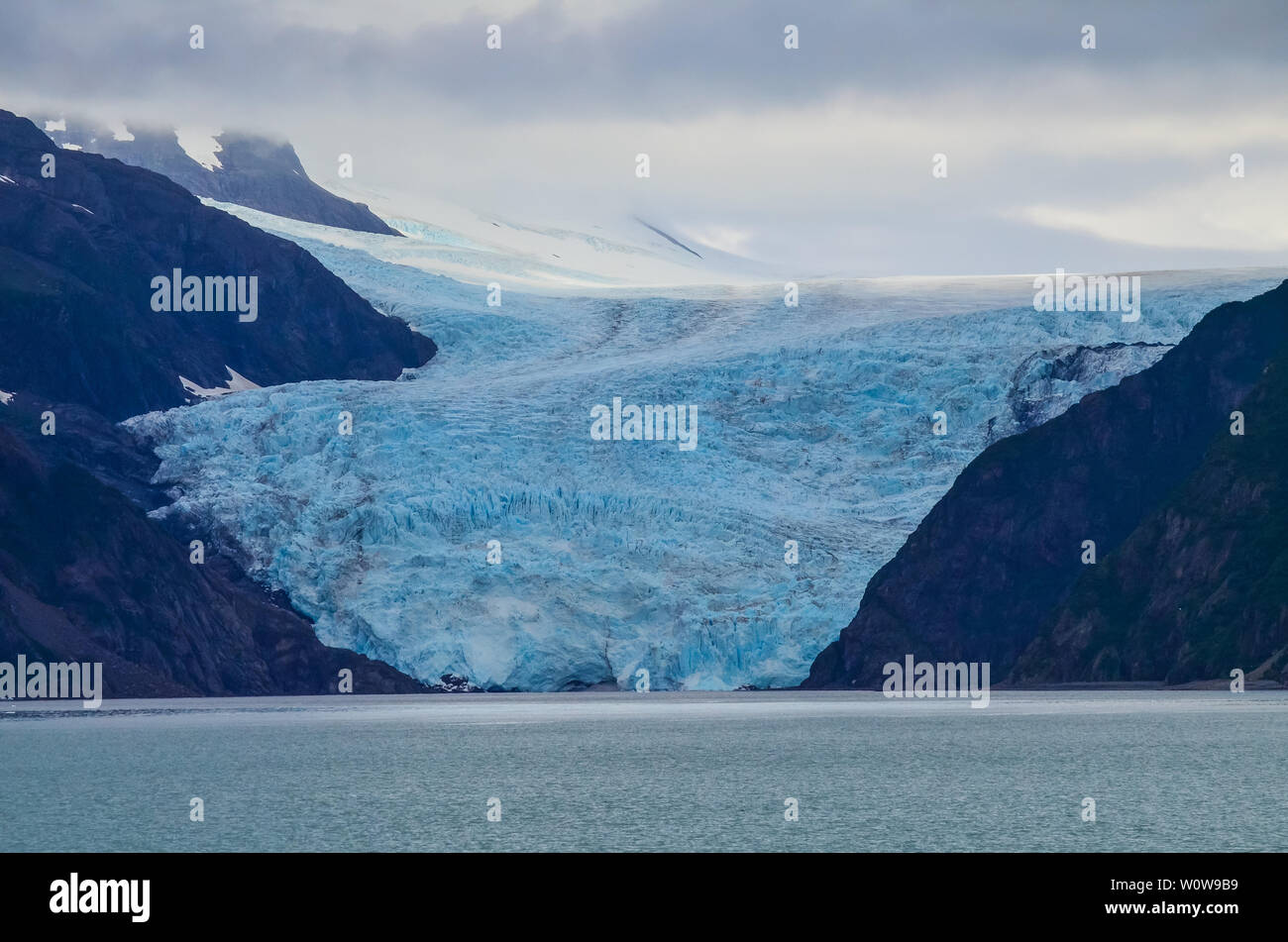 Distant view of a Holgate glacier in Kenai fjords National Park, Seward, Alaska, United States, North America. Stock Photo