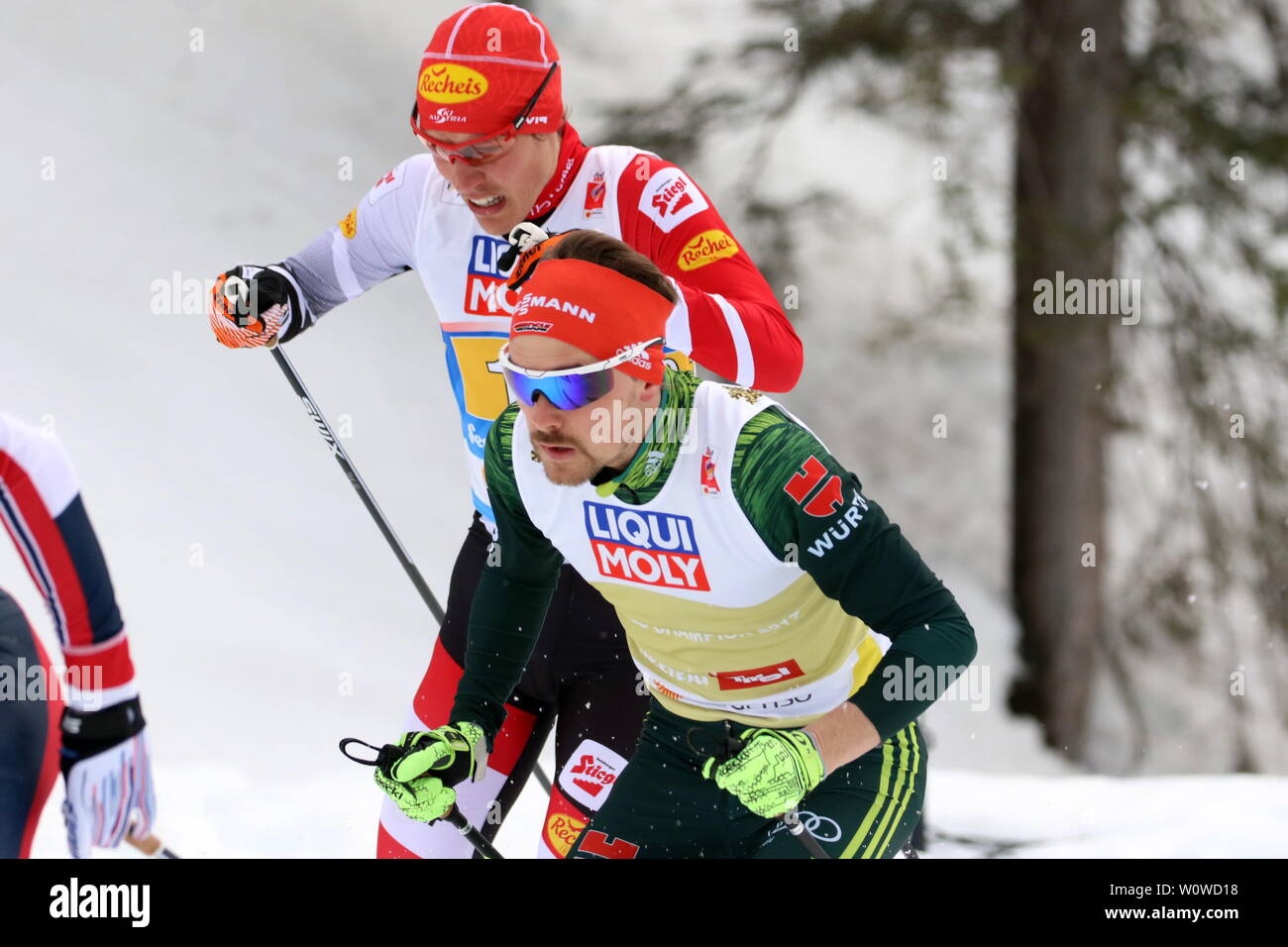 Fabian Riessle (SZ Breitnau /Deutschland) im Duell mit Franz-Josef Rehrl (WSV Ramsau / Österreich) beim  Team Nordische Kombination, FIS Nordische Ski-WM 2019 in Seefeld Stock Photo