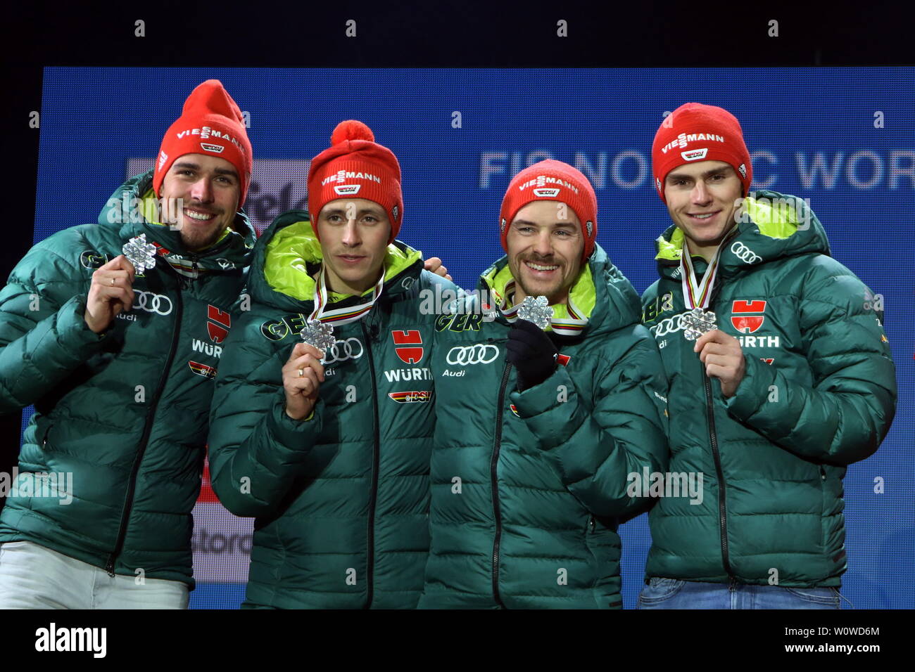 Silbermedaillengewinner im Team: v.li. Johannes Rydzek (Oberstdorf), Eric Frenzel (SSV Geyer), Fabian Riessle (SZ Breitnau /Deutschland) und Vinzenz Geiger (SC Oberstdorf)bei der FIS Nordische Ski-WM 2019 in Seefeld Stock Photo