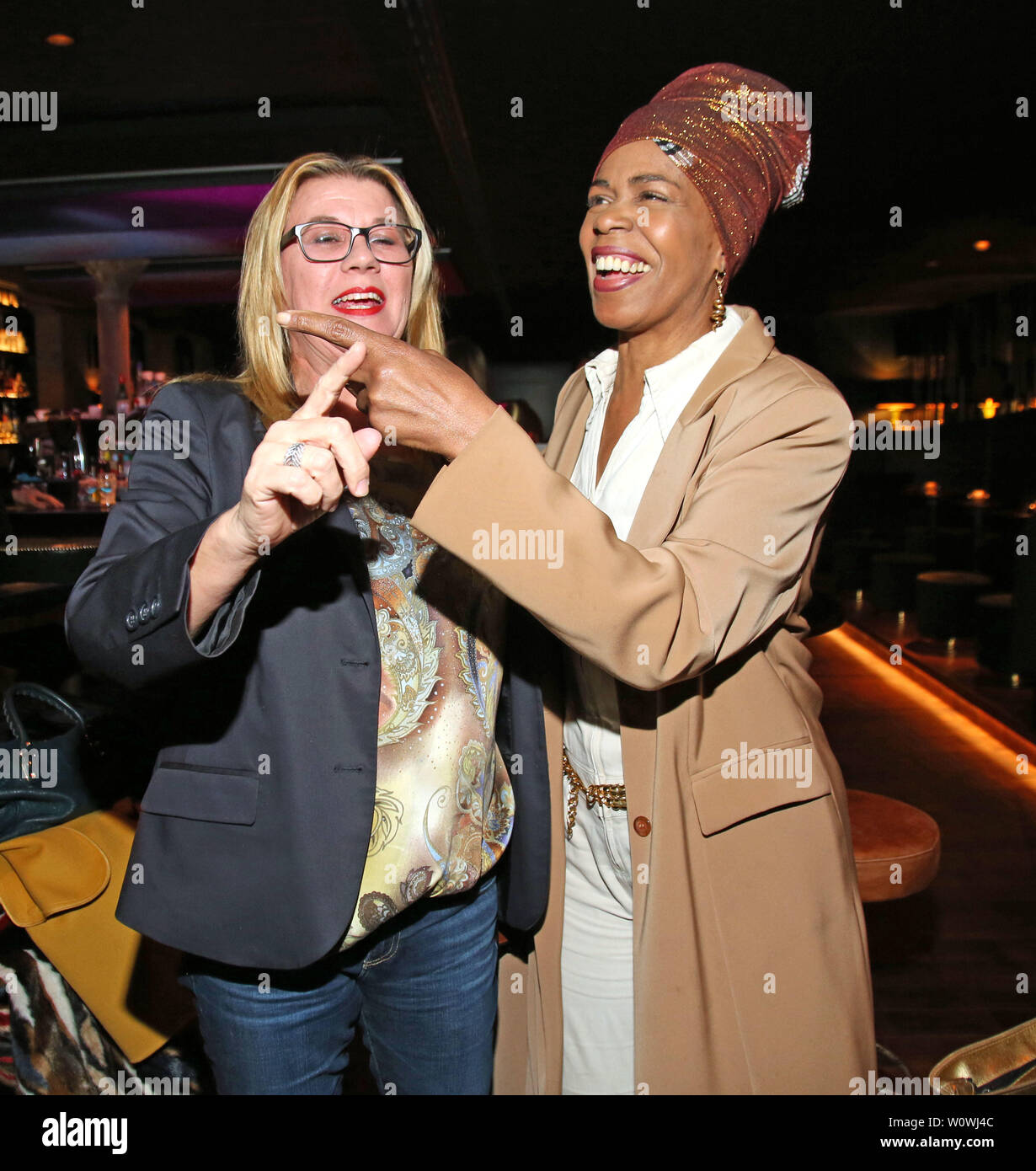 Claudia Schulz ( PR ) and  Love Newkirk,  Pre-Easter-Drink and After Work Event  at the Tortue  in Hamburg 2019 Stock Photo