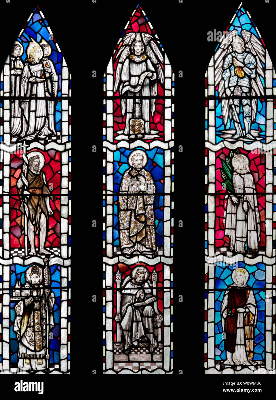 The East Window of the Arts and Crafts Church, All Saints, Brockhampton-by-Ross, Herefordshire, UK Stock Photo