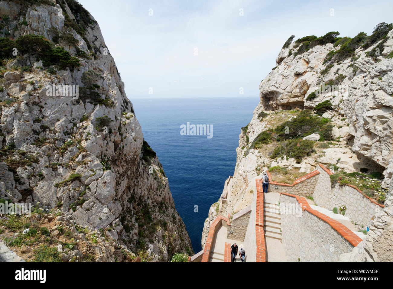 Stairs and path to the imposing Grotta di Nettuno in Sardegna (, Alghero, Italy) Stock Photo