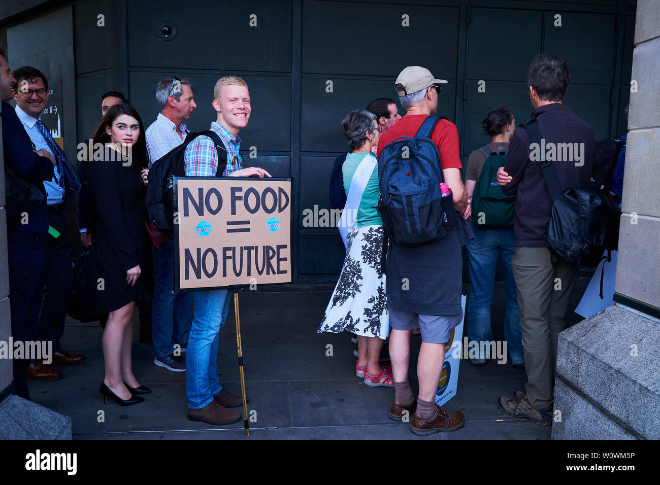Global Strike For Climate  26062019 - Man in queue waits to see his member of parliament bearing a placard saying ' no food no future'. Stock Photo