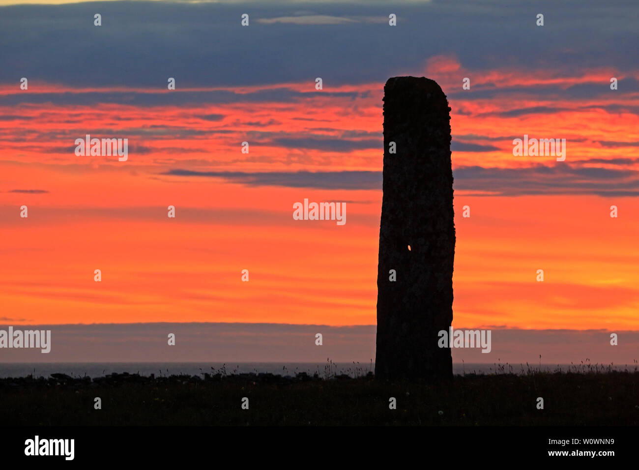 Stan Stane at sunset on North Ronaldsay Orkney Scotland Stock Photo
