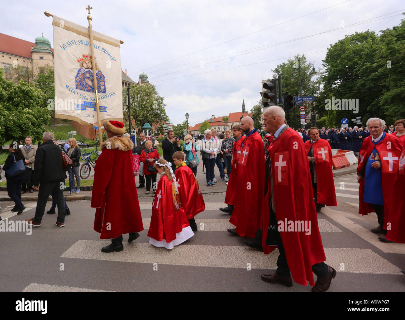 Krakow. Cracow. Poland. St. Stanislaw procession from Wawel Royal Castle to Skalka Church. Members of the Jesus the King of Poland brotherhood. Stock Photo