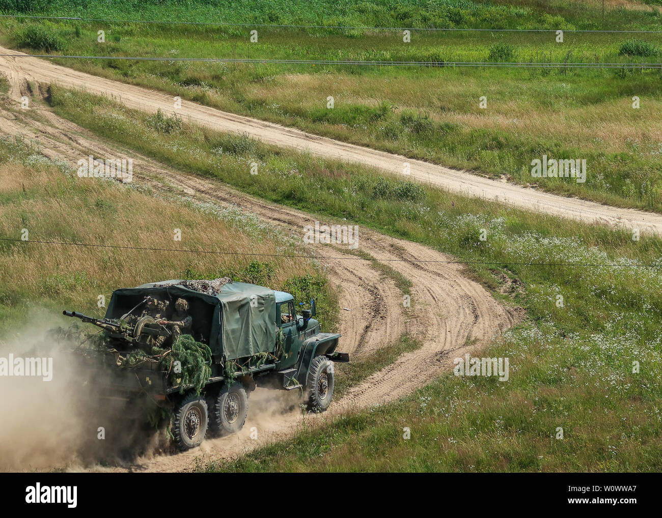 A Ukrainian ZU-23 anti-aircraft gun provides defense during the 95th Air Assault Brigade's wet gap crossing. Stock Photo