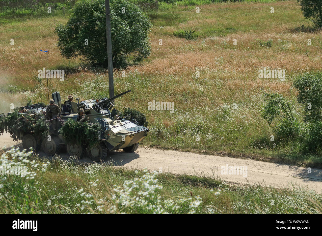 A Ukrainian BTR returns after conducting a wet gap crossing Stock Photo