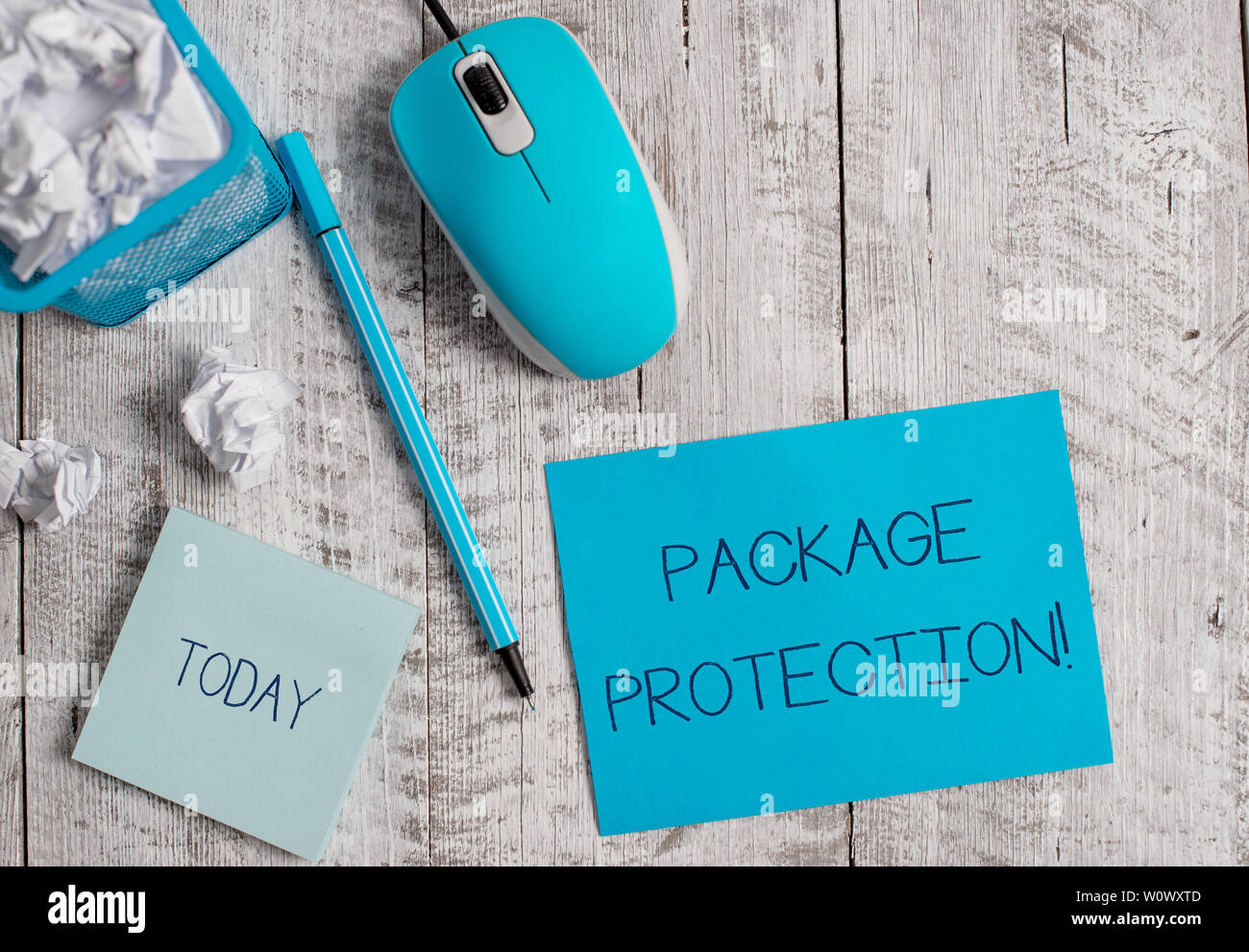 Conceptual hand writing showing Package Protection. Concept meaning Wrapping and Securing items to avoid damage Labeled Box Crumpled paper in bin and Stock Photo