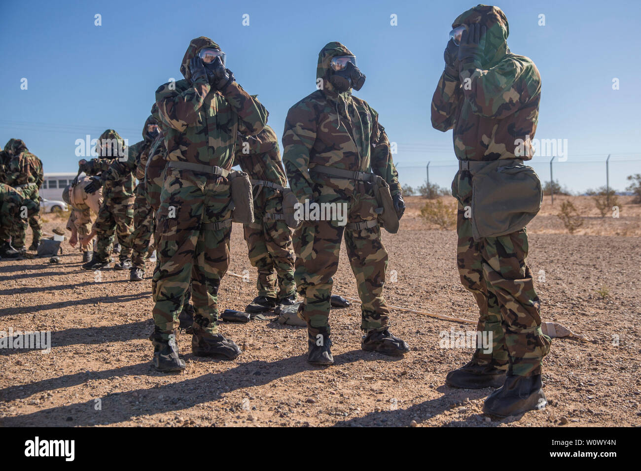 U.S. Marines stationed at Marine Corps Air Station (MCAS) Yuma conduct their Chemical, Biological, Radiological and Nuclear Defense (CBRN) training at the MCAS Yuma, Ariz. Gas Chamber, June 27, 2019. The gas chamber is a controlled environment in which a non-lethal gas is released, allowing Marines to test their issued gas masks and become familiar with the effects of gas. (U.S. Marine Corps photo by Cpl. Sabrina Candiaflores) Stock Photo