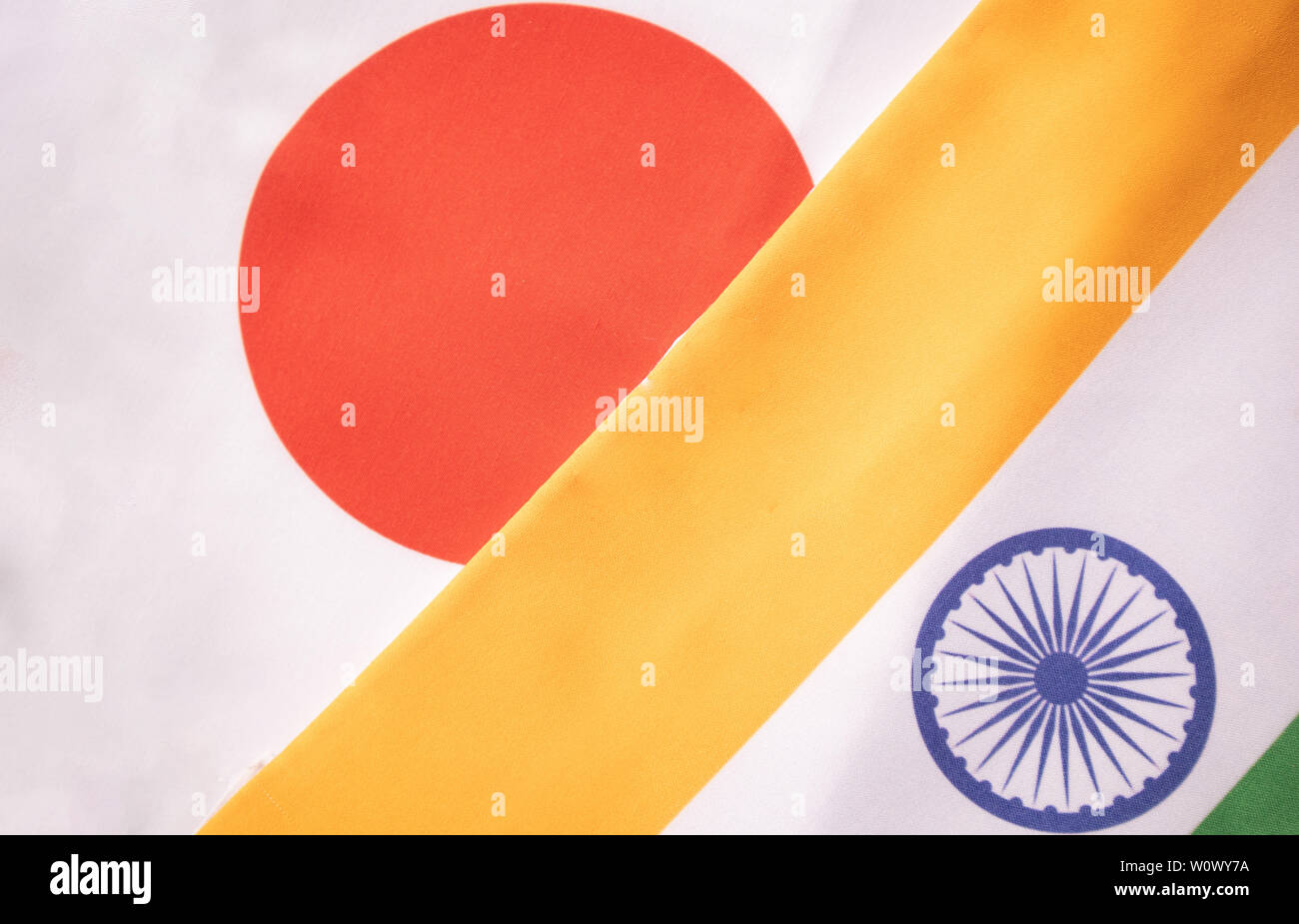 Concept of Bilateral relationship between two countries showing with two flags: India and Japan. Stock Photo