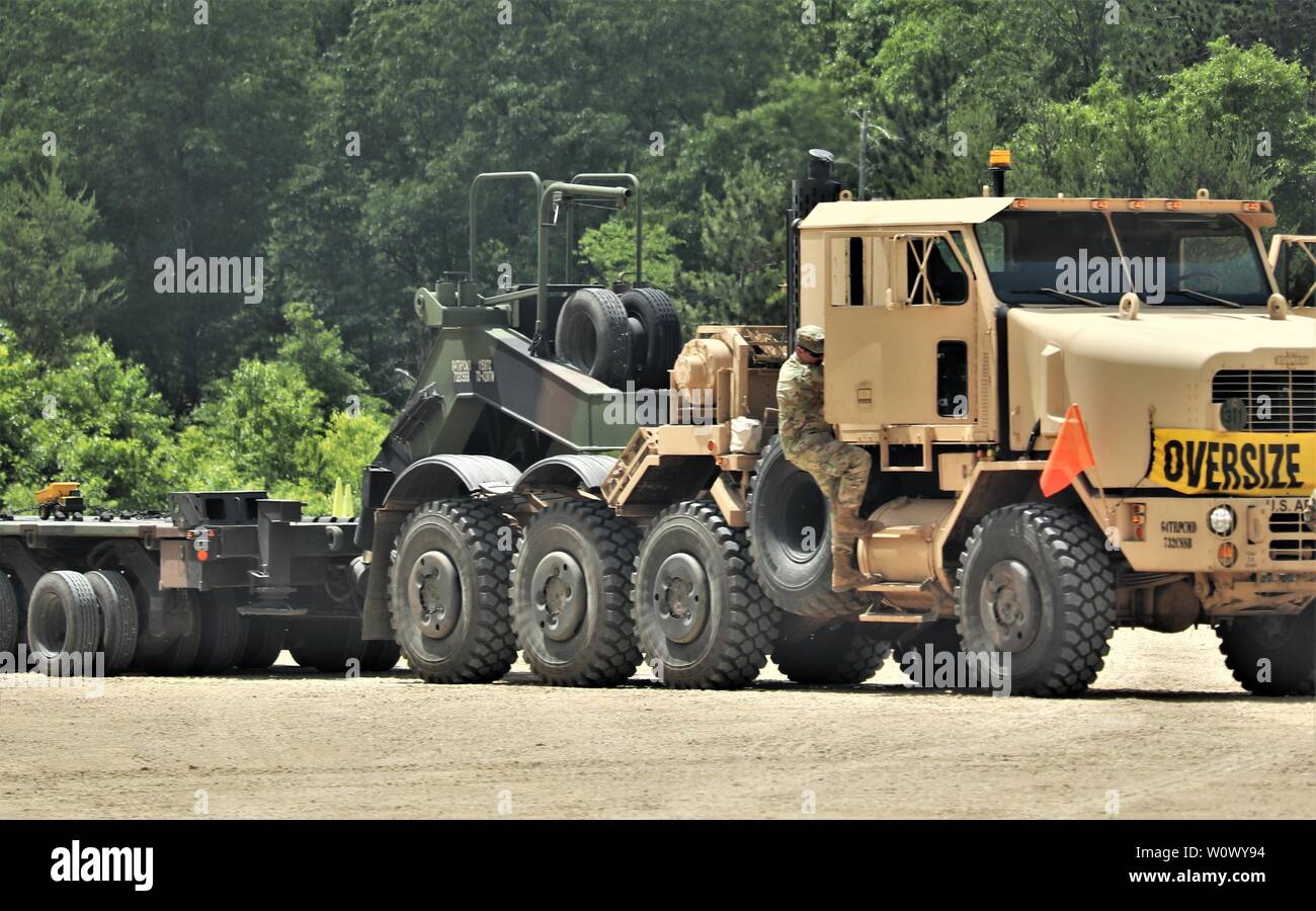 Wisconsin National Guard Soldiers conduct driver training June 19, 2019, at the parking area at Big Sandy Lake on South Post at Fort McCoy, Wis. The activity was part of annual training by Wisconsin National Guard troops at Fort McCoy in early June. Thousands of transient training troops trained at the installation in June 2019. (U.S. Army Photo by Scott T. Sturkol, Public Affairs Office, Fort McCoy, Wis.) Stock Photo