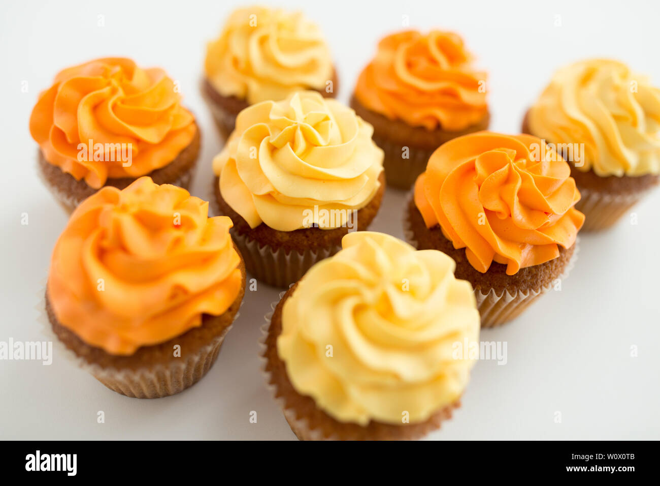 cupcakes with frosting on white background Stock Photo
