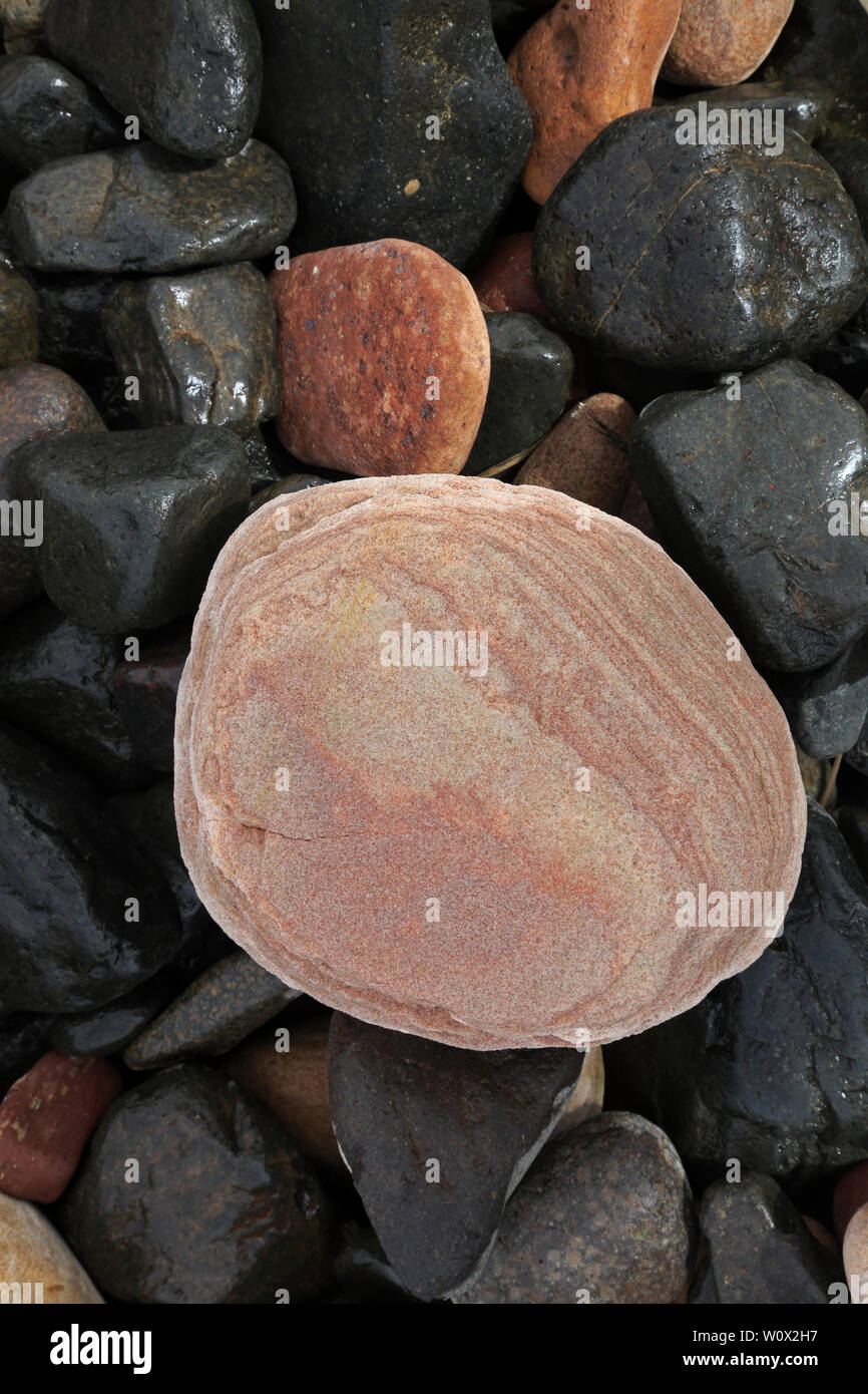 Coloured Pebbles on the beach at Rackwick Bay Hoy Scotland Stock Photo