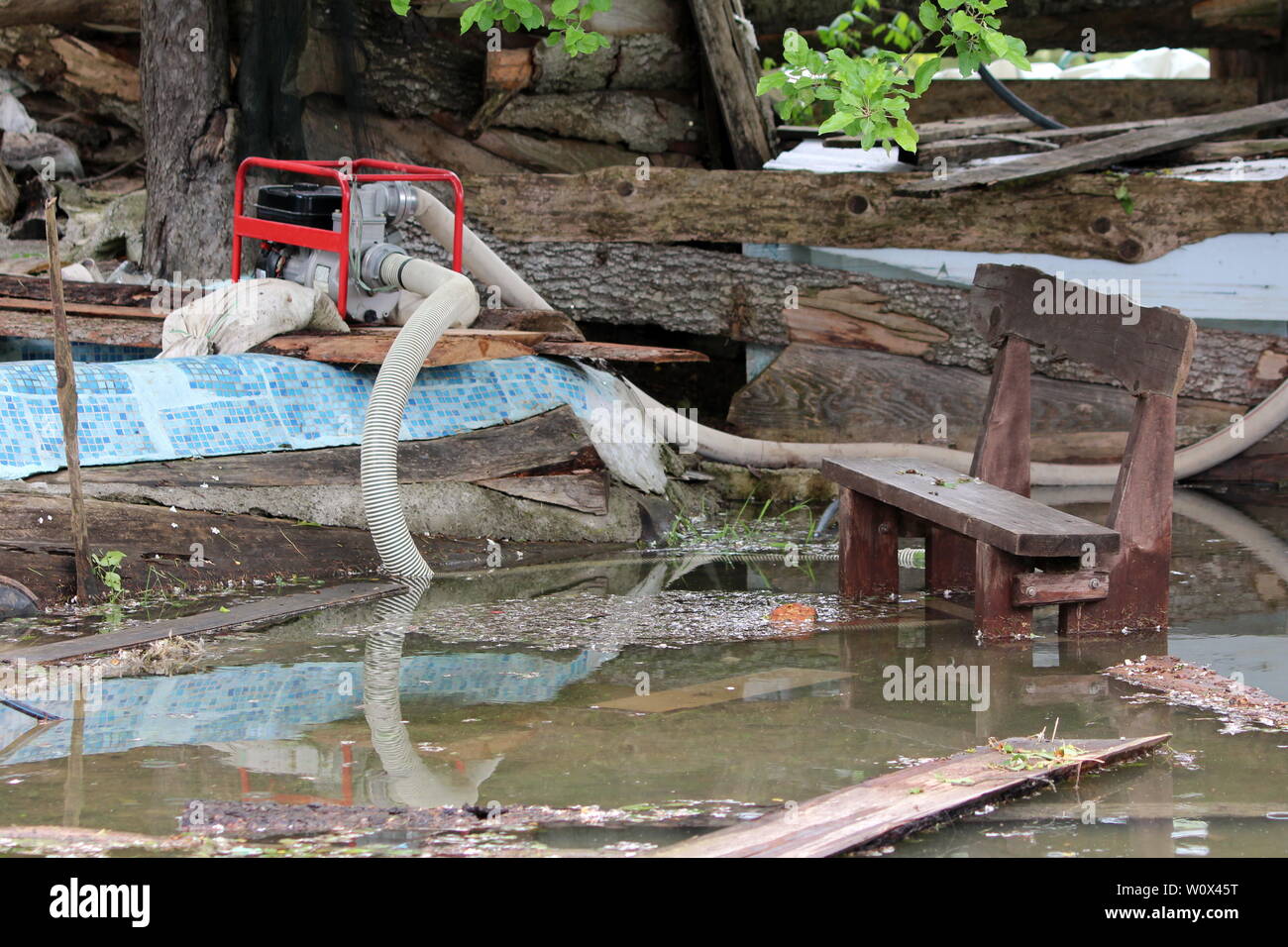 Family house backyard completely destroyed during natural disaster with