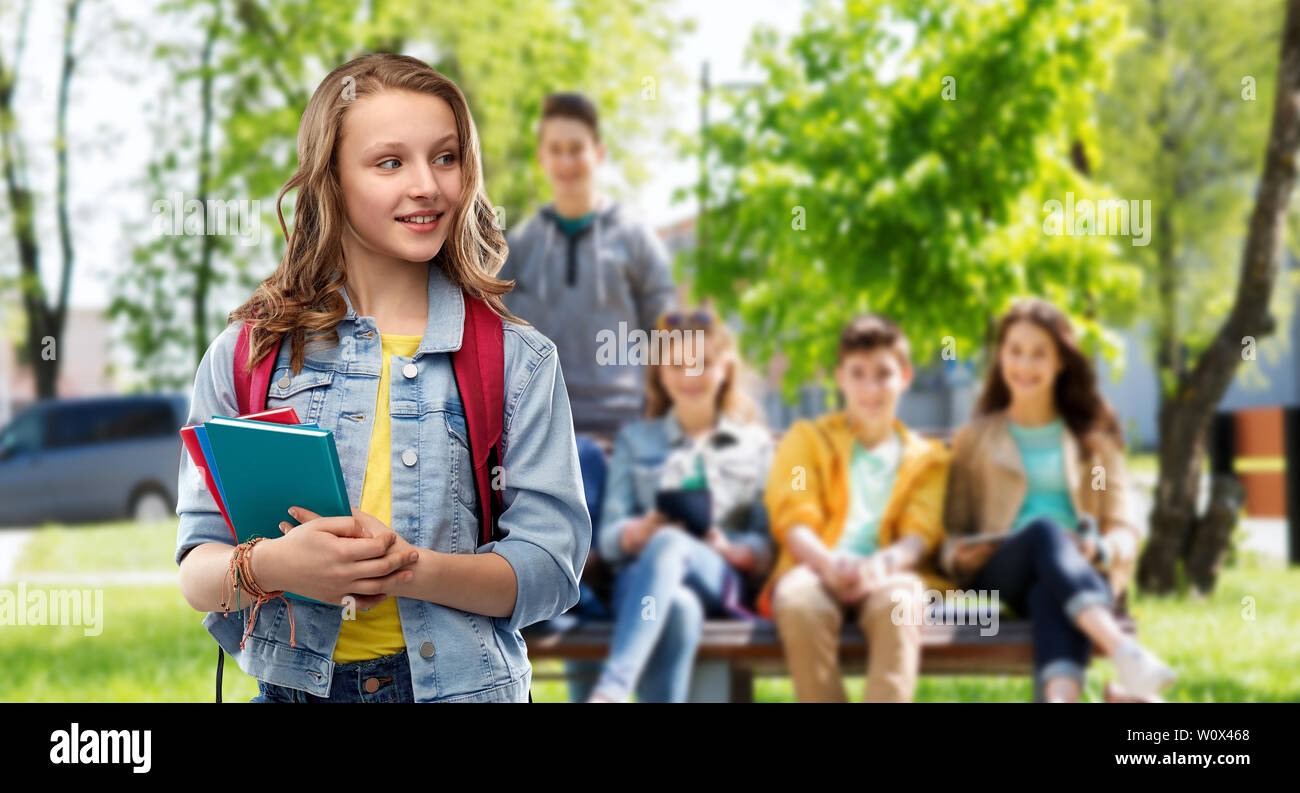 happy smiling teenage student girl with school bag Stock Photo - Alamy