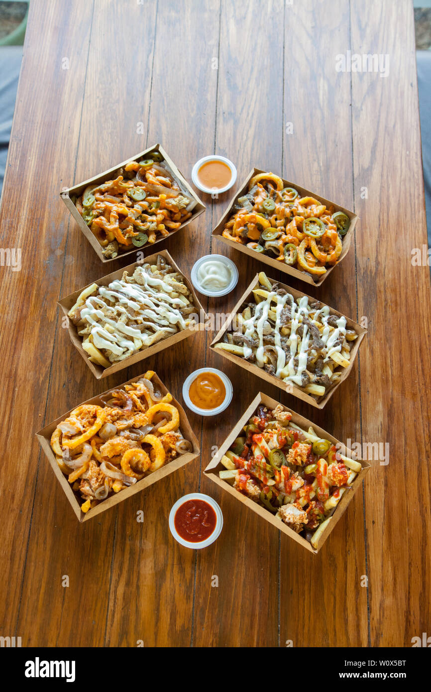 Poutine french fries curly dips gravy Stock Photo Alamy