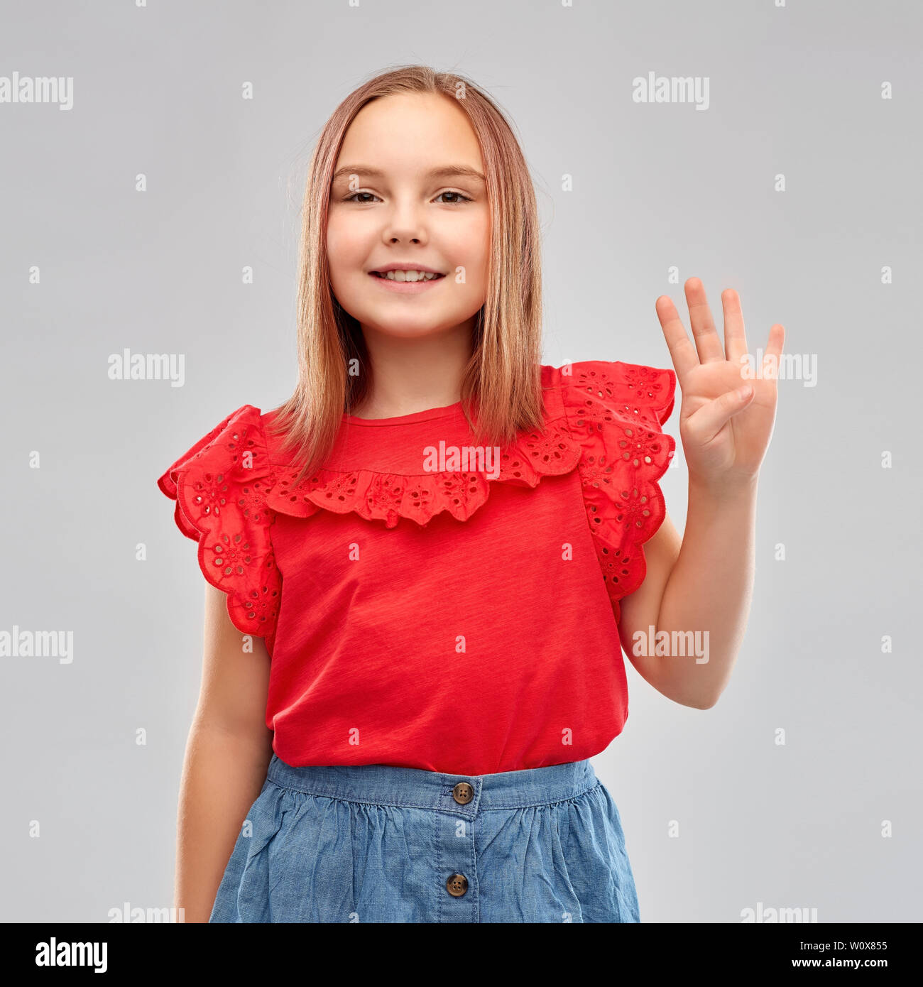 Girl showing four fingers hand hi-res stock photography and images - Alamy