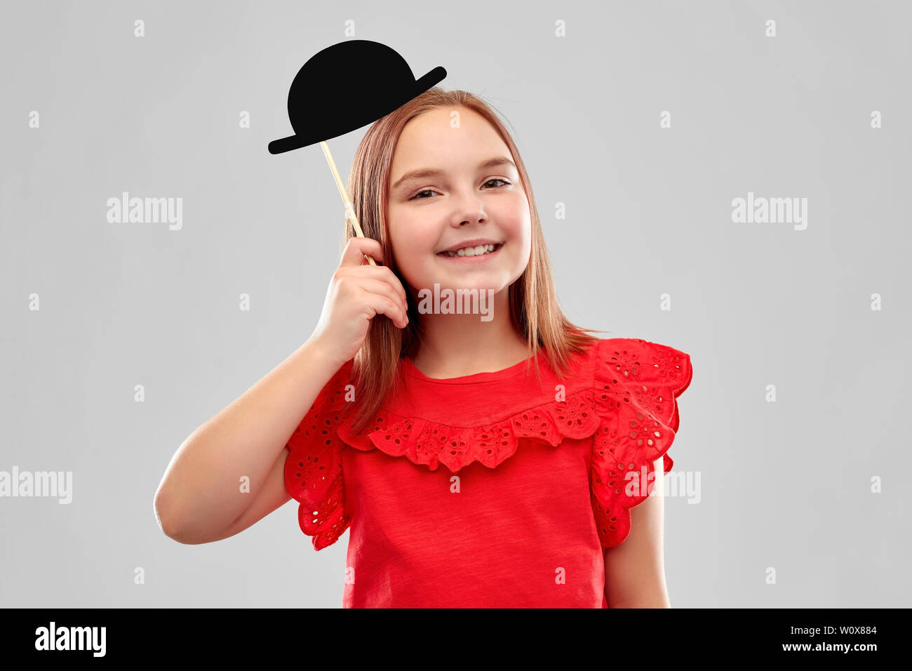 beautiful smiling girl with black bowler hat Stock Photo - Alamy