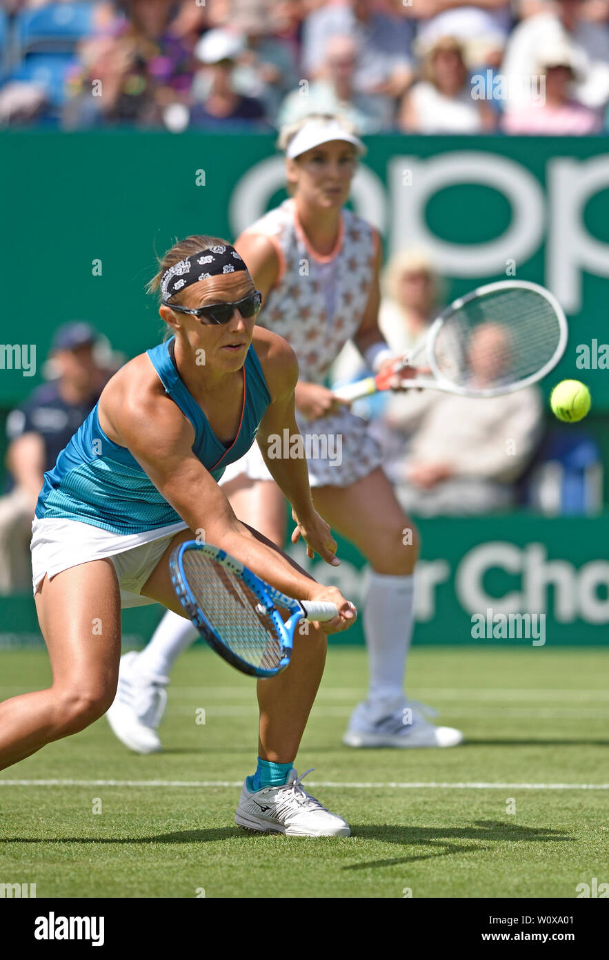 Kirsten Flipkens (Ned - sunglasses) and Bethanie Mattek-Sands (USA) playing  in the semi final of the ladies doubles at the Nature Valley International  tennis at Devonshire Park, Eastbourne, UK. 28th June, 2019