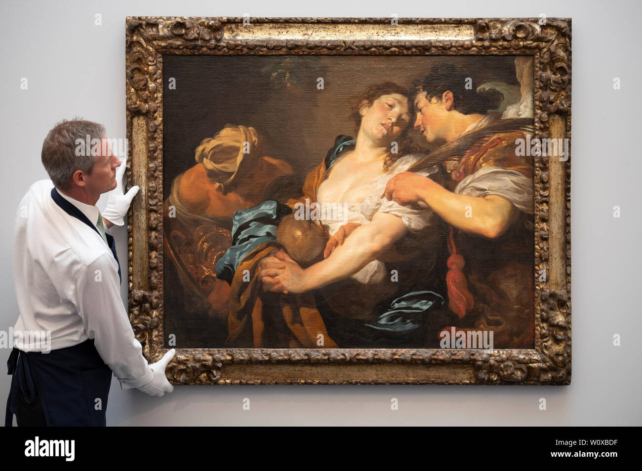 Sotheby’s, London, UK. 28th June 2019. Major works by Botticelli, Brueghel, Rubens and landscapes by Gainsborough, Turner and Constable in one of the most valuable Old Masters sales ever staged, to take place on 3 July 2019. Image: Johann Liss, The Temptation of Saint Mary Magdalene. Estimate £4-6 million. Credit: Malcolm Park/Alamy Live News. Stock Photo