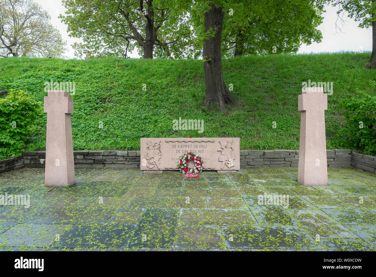 Oslo War Memorial, view of memorial to Norwegian resistance fighters at the Akerhus rampart wall where they were execued by Nazi occupation forces. Stock Photo