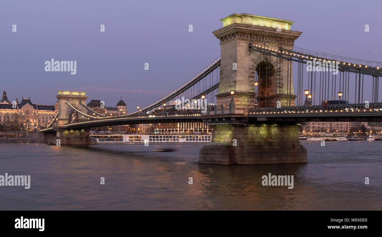 Szechenyi Chain Bridge over the Danube River in Budapest at sunset Stock Photo