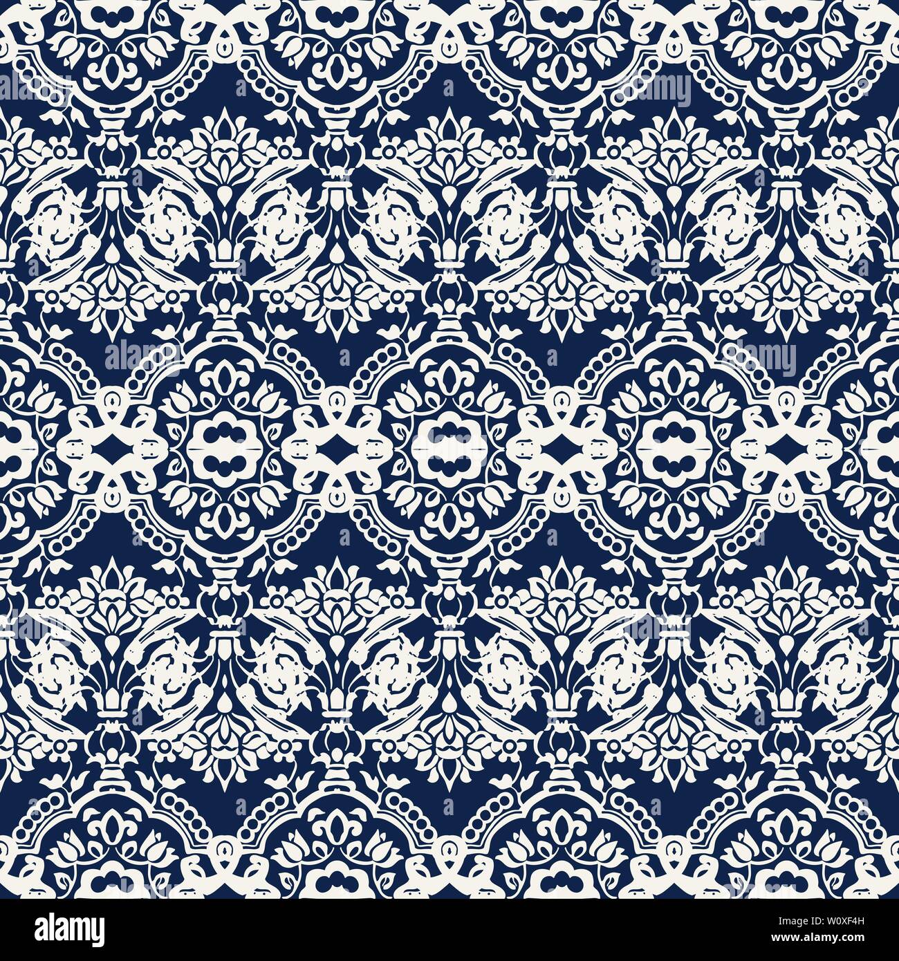 Indigo dye woodblock printed seamless ethnic floral damask pattern. Traditional oriental ornament of India with exotic flowers, ecru on navy blue Stock Vector
