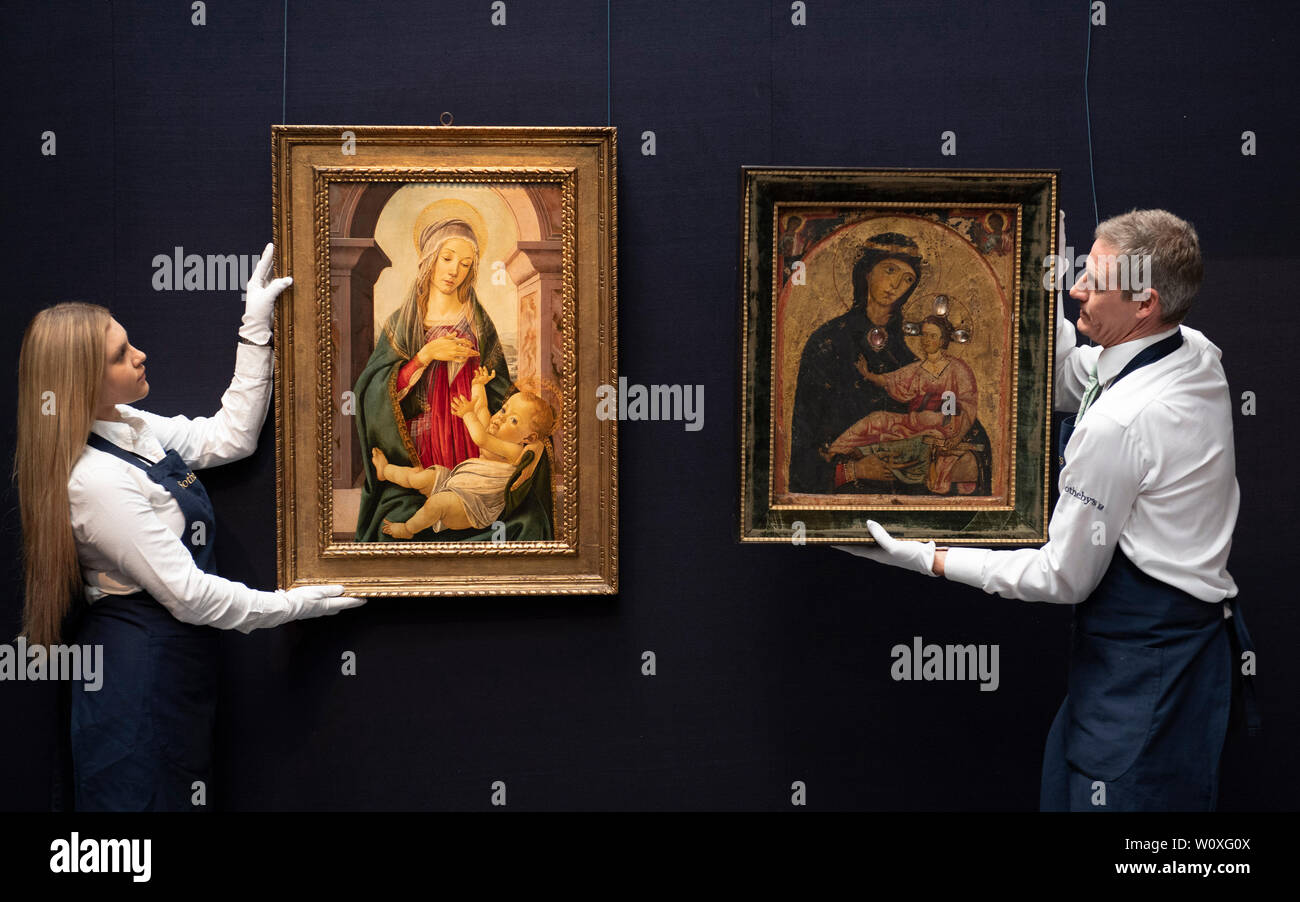 Sotheby’s, London, UK. 28th June 2019. Major works by Botticelli, Brueghel, Rubens and landscapes by Gainsborough, Turner and Constable in one of the most valuable Old Masters sales ever staged, to take place on 3 July 2019. Image (l to r): Sandro Bottocelli and Studio, Madonna and Child, seated before a classical window. Estimate £1,200,000-2,000,000; Earliest painting in the sale, around mid-1230s, Third Master of Anagi, The Madonna and Child, two angels in the spandrels above. Estimate £200,000-300,000. Credit: Malcolm Park/Alamy Live News. Stock Photo