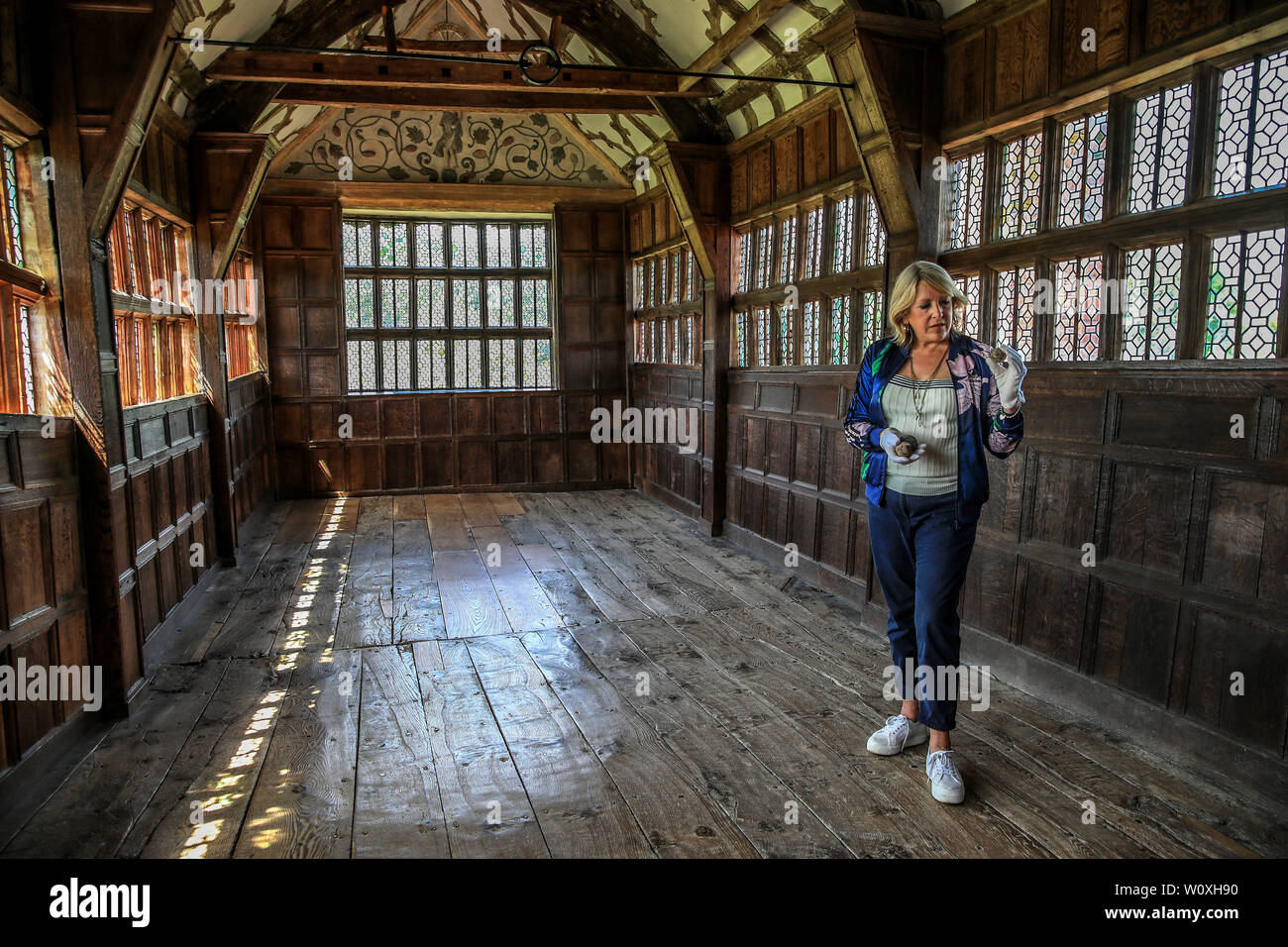 Artist Hilary Jack was inspired to create a new artwork with Tudor tennis balls, found by the National Trust over recent years behind panelling at Little Moreton Hall in Cheshire. Stock Photo