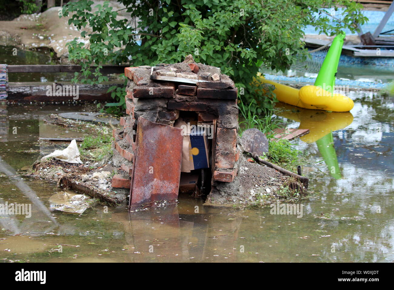 Red brick backyard barbecue completely destroyed during natural ...