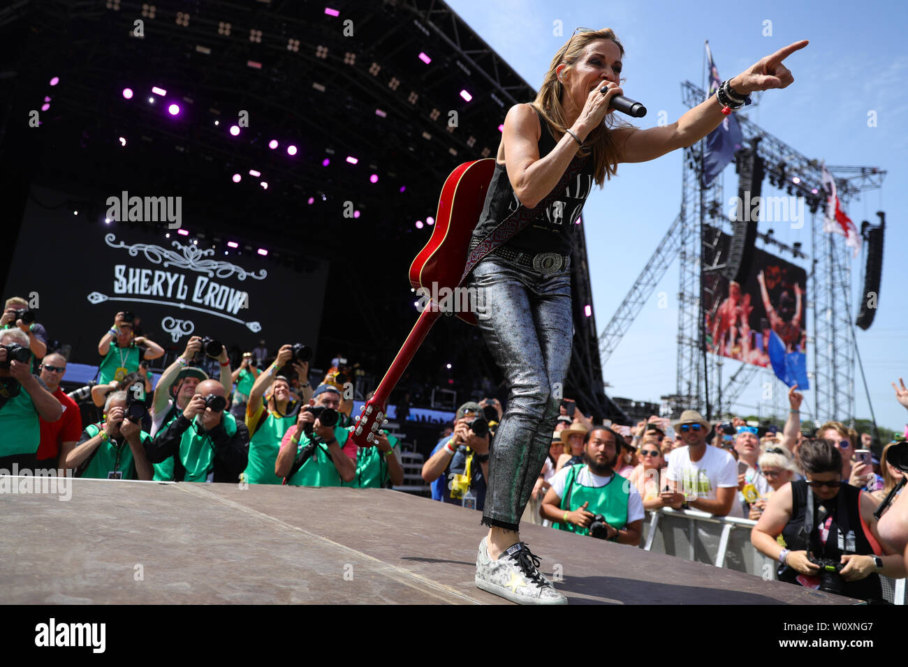 Sheryl Crow on the Pyramid Stage on the third day of the Glastonbury Festival at Worthy Farm in Somerset. Stock Photo