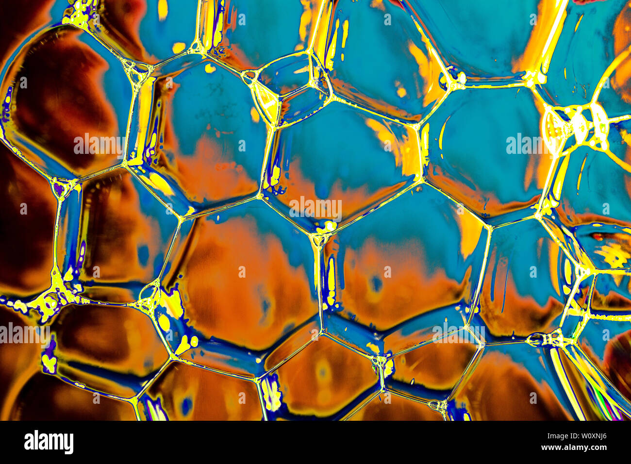 Oil bubbles inside water base form patterns Stock Photo - Alamy