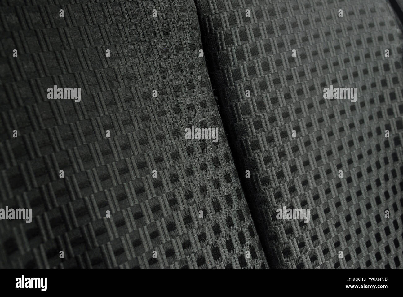 Mesh pattern background.Background patterned leather car seats. Stock Photo
