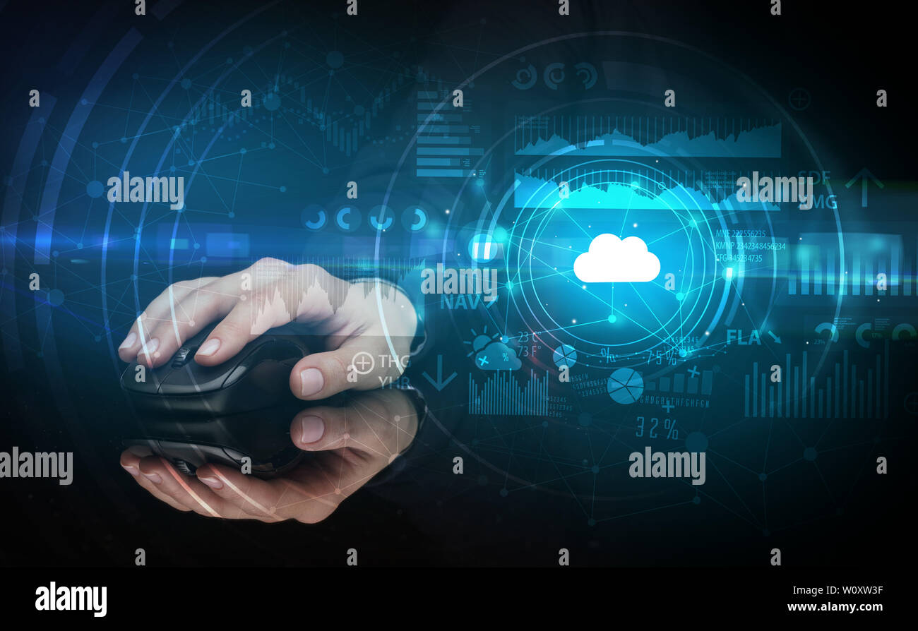 Hand using wireless mouse with cloud technology concept and dark background Stock Photo