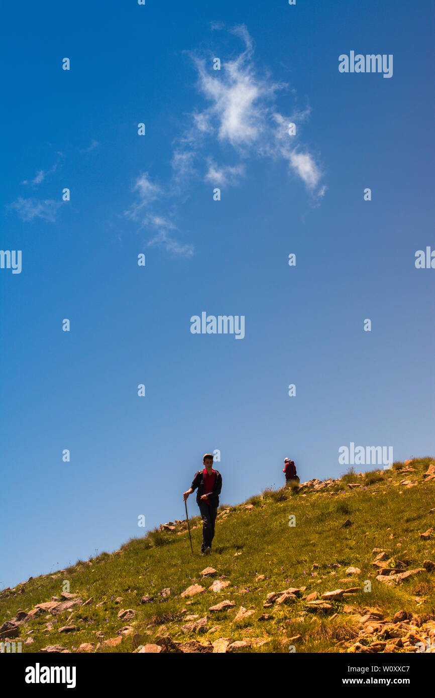 Boy traveler trekking poles hi-res stock photography and images - Alamy