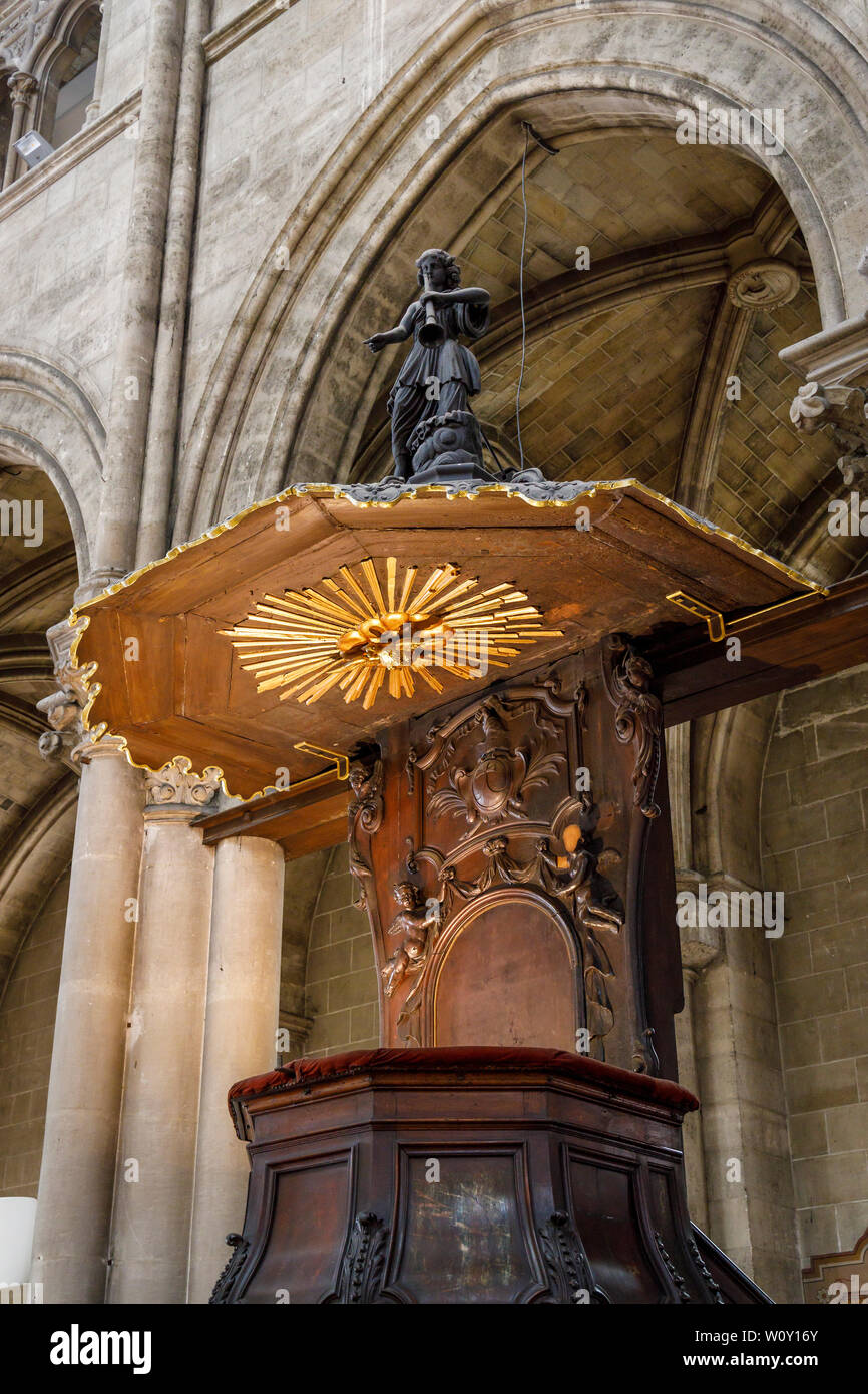 The Church of Saint-Louis-des-Chartrons in Bordeaux, France. 1880 Gothic Revival style Catholic church. Pulpit from the earlier 1726 church. Stock Photo