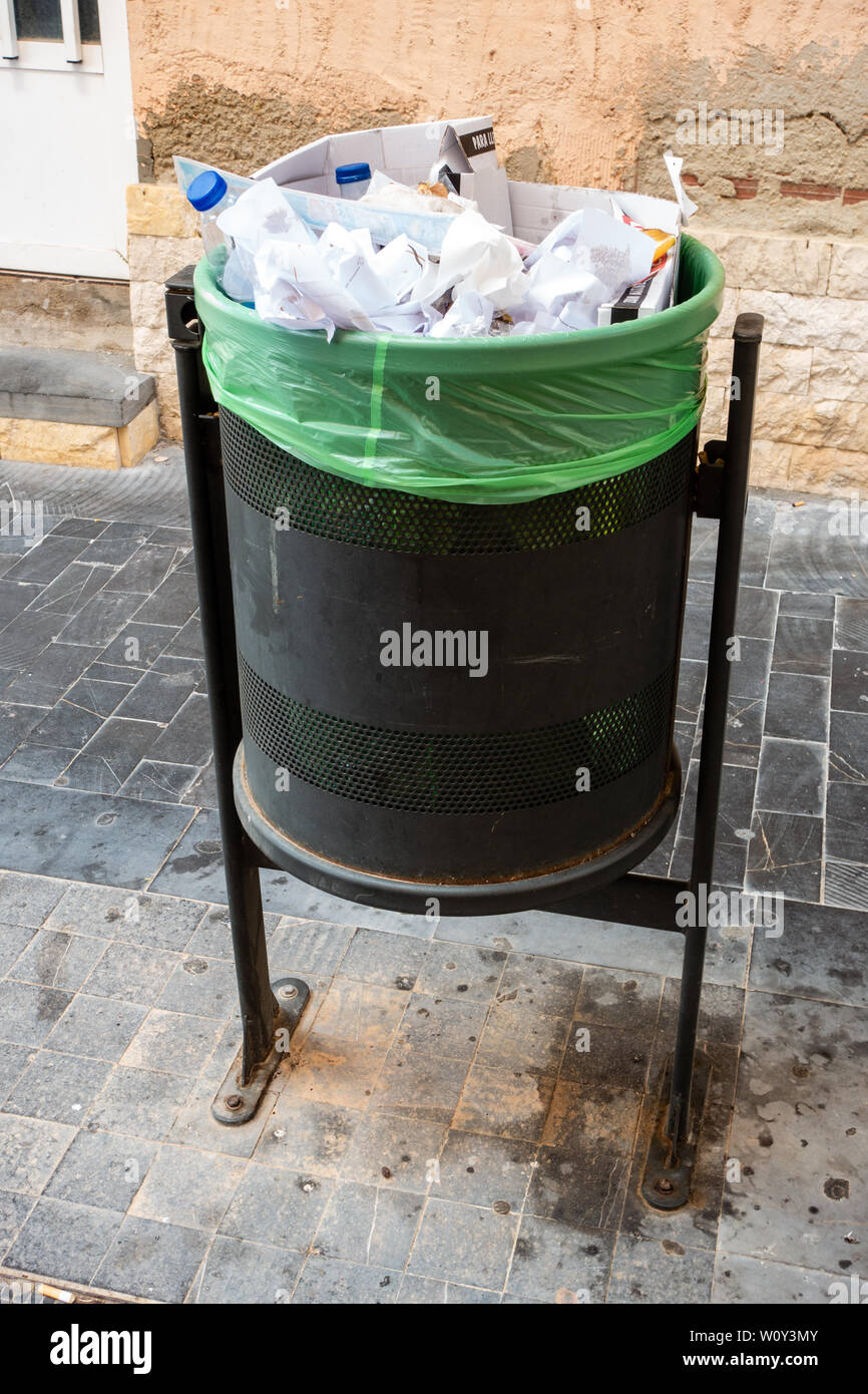 full waste bin Stock Photo Alamy