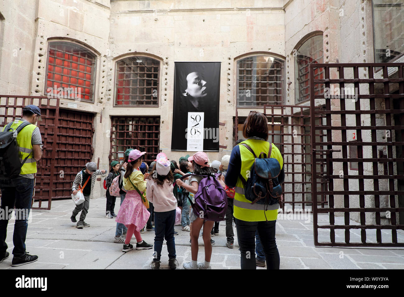 Rear view of teachers and primary school children on cultural tour at the Portuguese Centre of Photography Porto Oporto Portugal Europe  KATHY DEWITT Stock Photo
