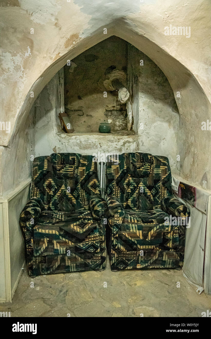 Armchairs in basement snug Stock Photo