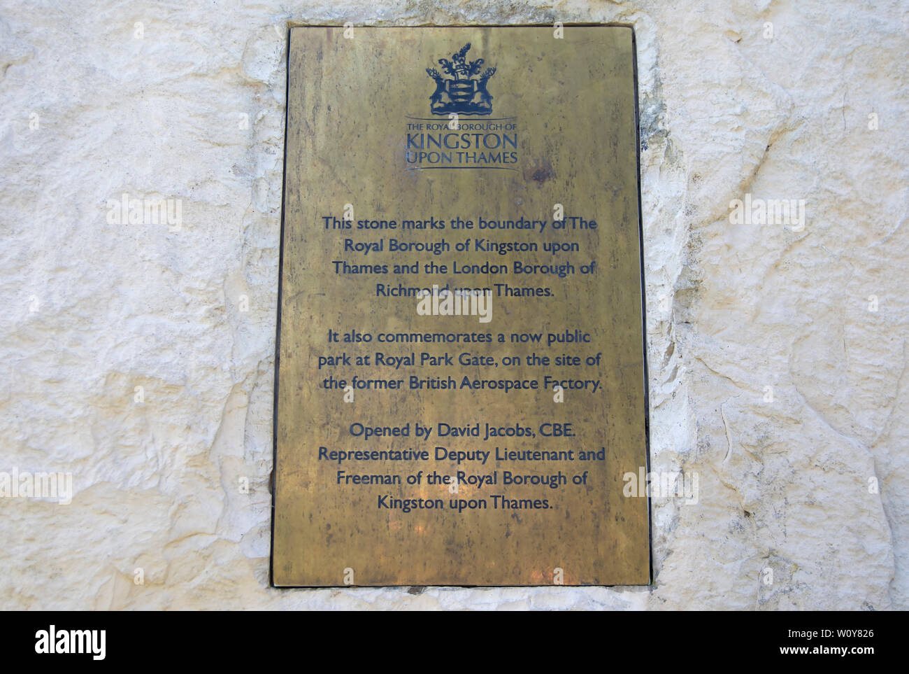 plaque marking the boundary between the london boroughs of kingston