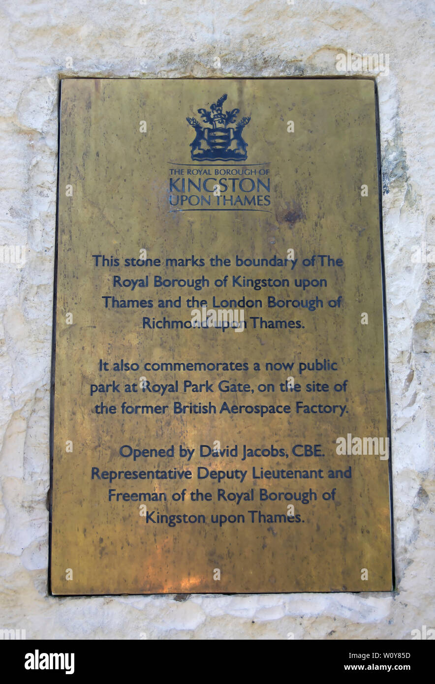 plaque marking the boundary between the london boroughs of kingston